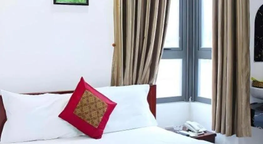 Bed in Mi Linh Hotel