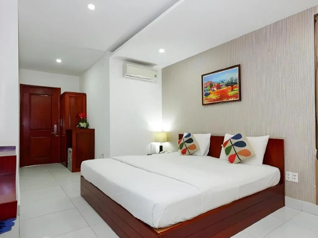 Bed in Mi Linh Hotel