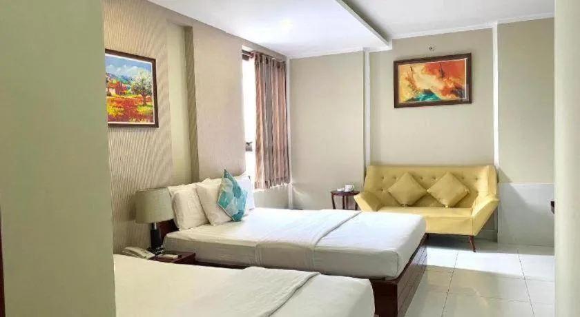 Bed in Mi Linh Hotel