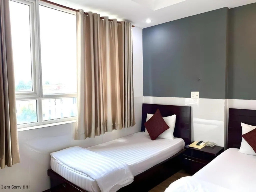 Bed in Mi Linh Hotel