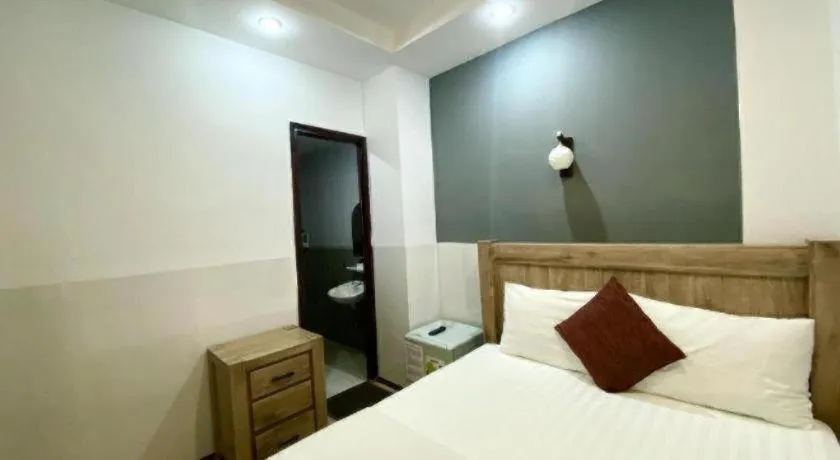 Bed in Mi Linh Hotel