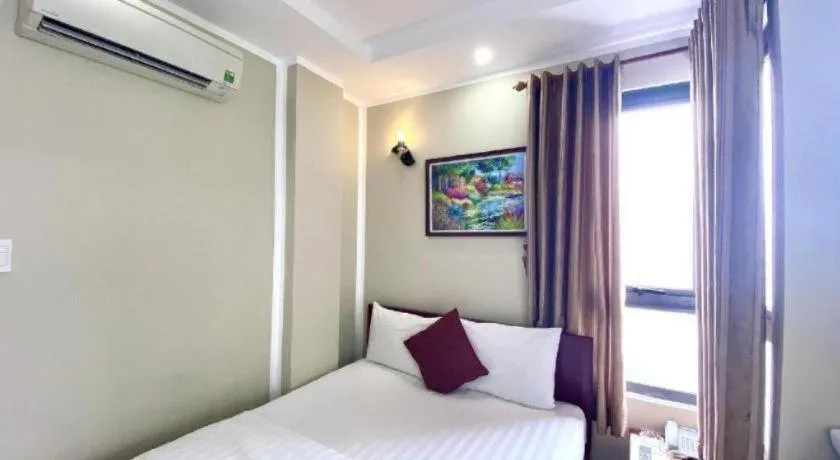 Bed in Mi Linh Hotel