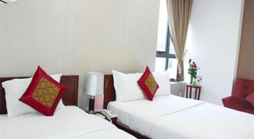 Bed in Mi Linh Hotel