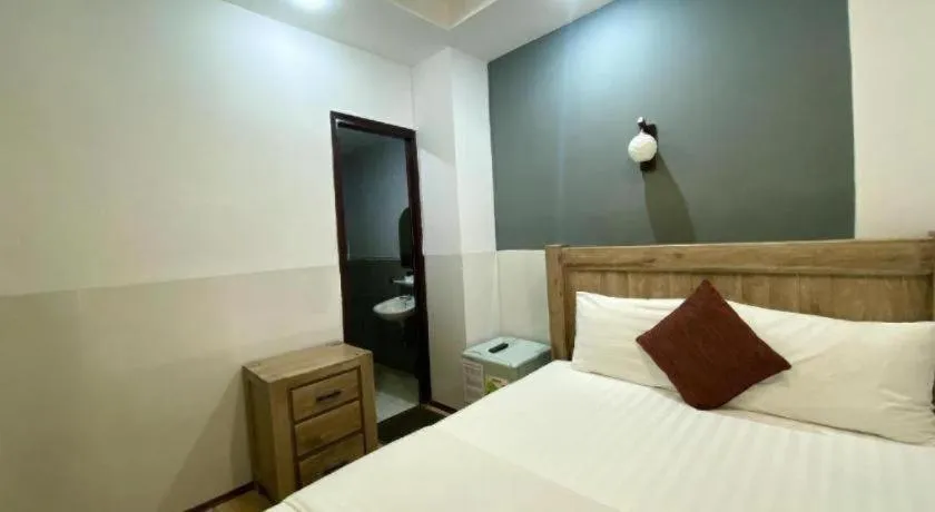 Bed in Mi Linh Hotel