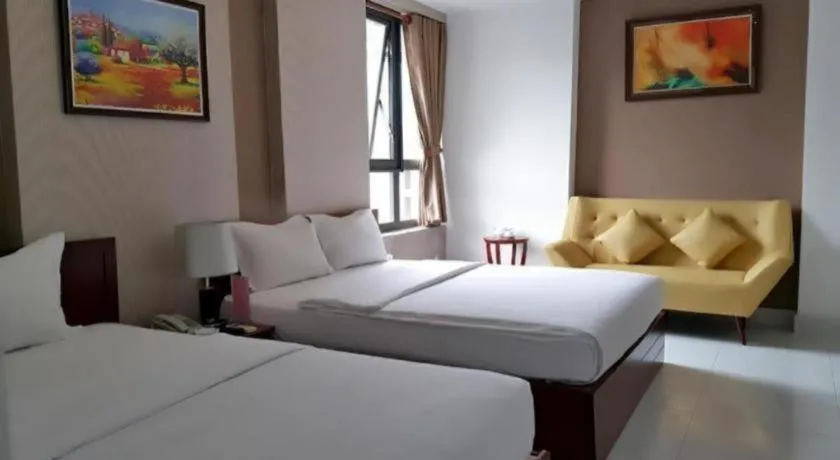 Bed in Mi Linh Hotel