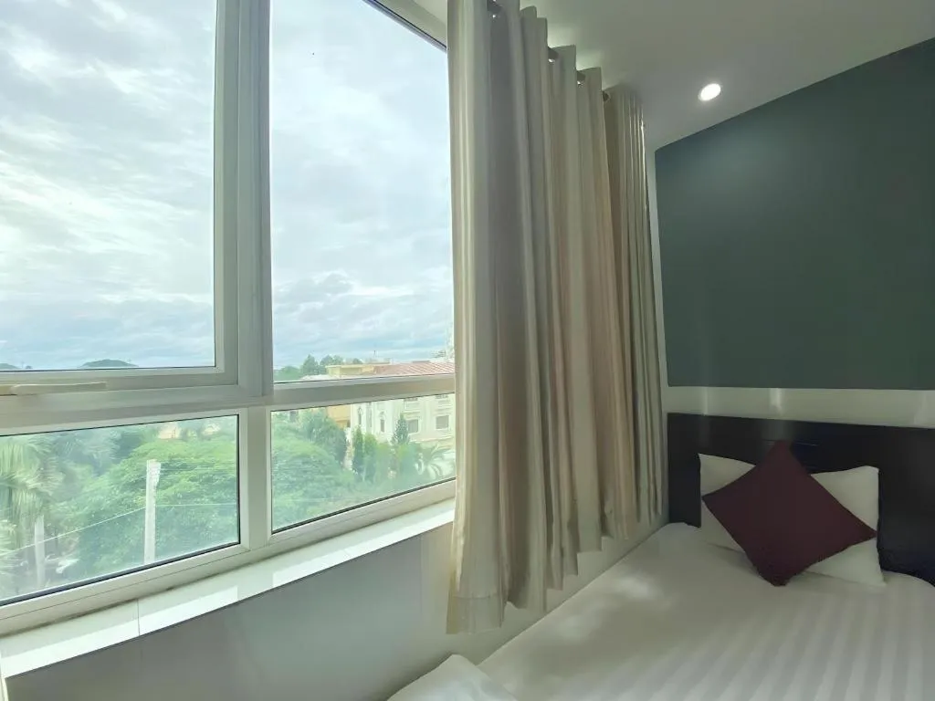 Bed in Mi Linh Hotel