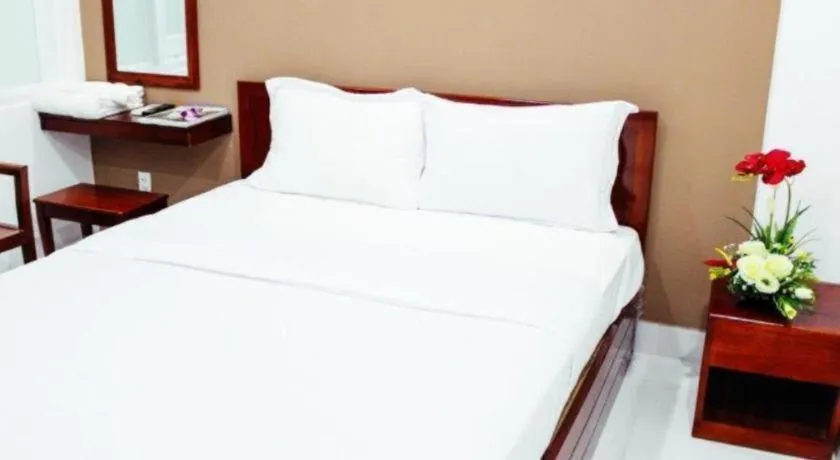 Bed in Mi Linh Hotel