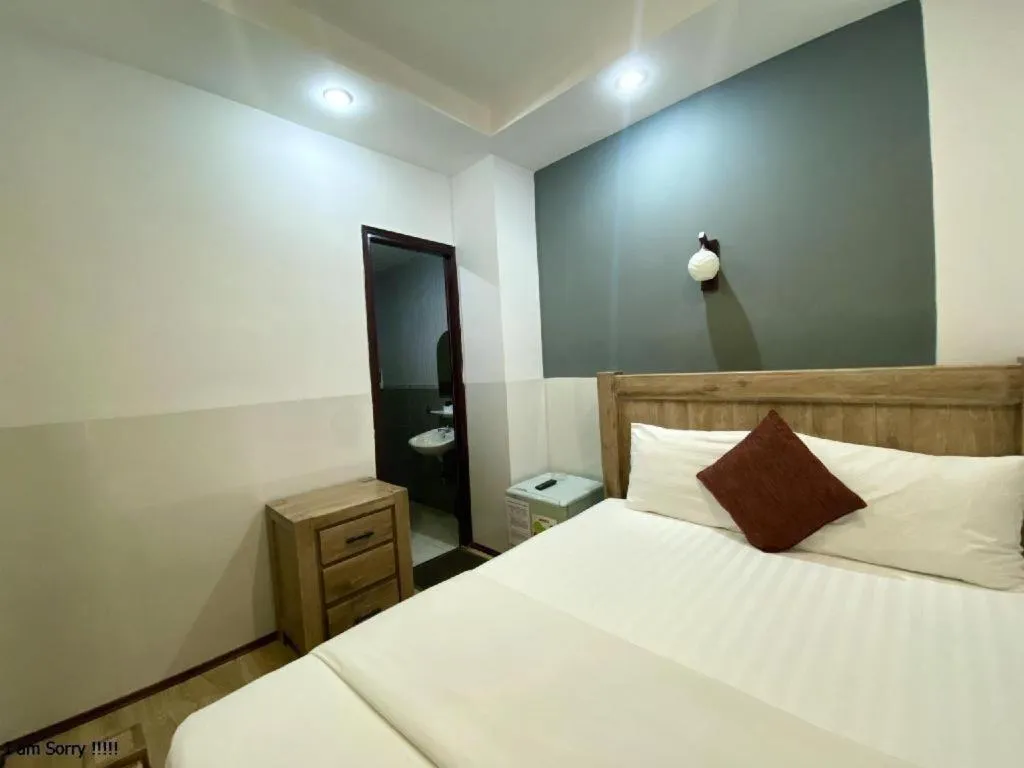 Bed in Mi Linh Hotel