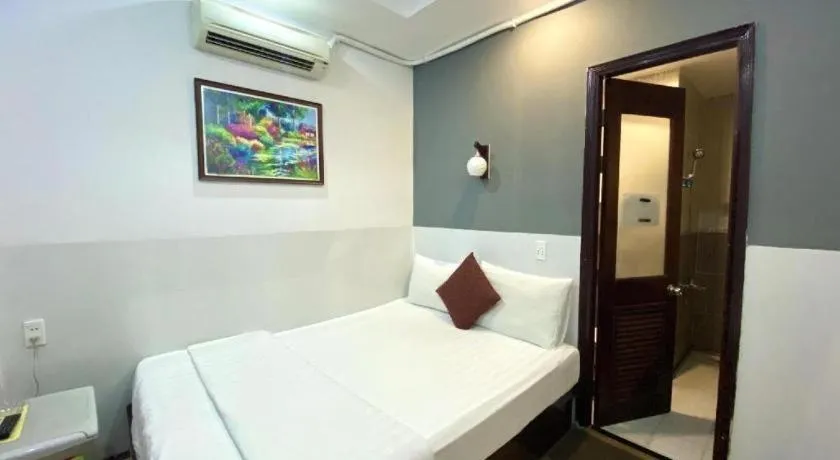 Bed in Mi Linh Hotel