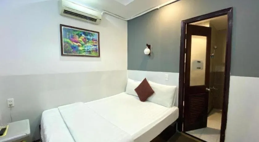 Bed in Mi Linh Hotel