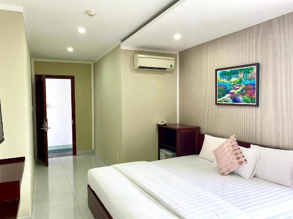 Bed in Mi Linh Hotel