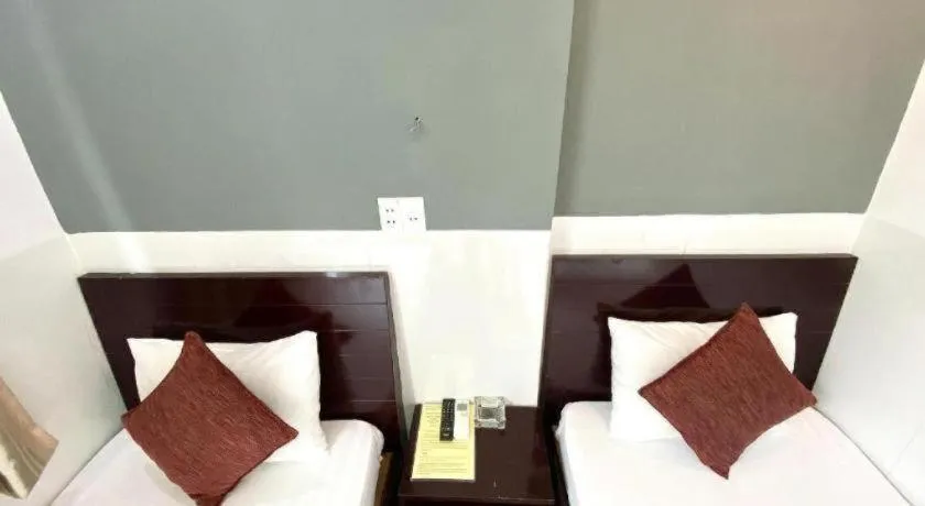 Bed in Mi Linh Hotel