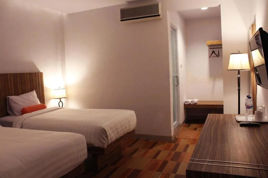 Bed in Satria Wisata Hotel
