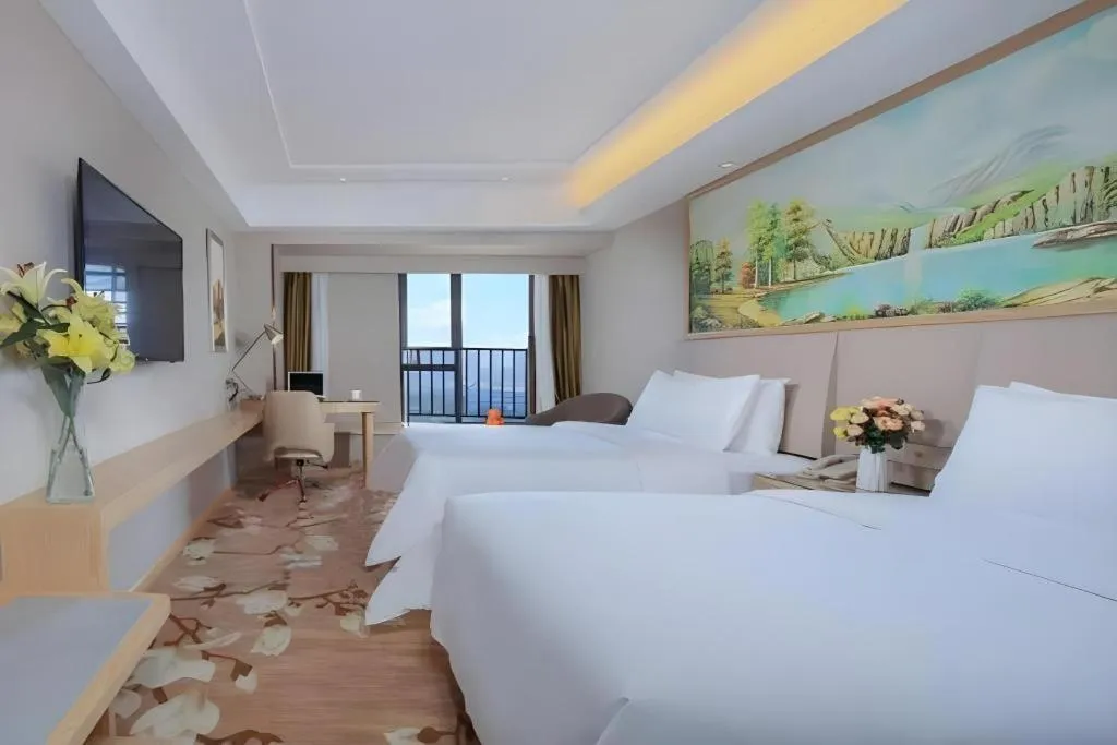 Bed in Vienna Hotel Yunnan Chunrong Street Qicai Yunan