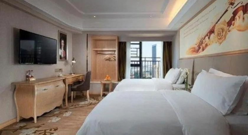 Bed in Vienna Hotel Yunnan Chunrong Street Qicai Yunan