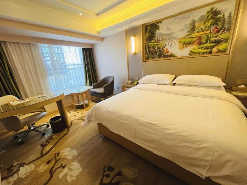 Bed in Vienna Hotel Yunnan Chunrong Street Qicai Yunan