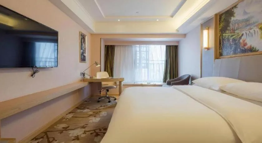 Bed in Vienna Hotel Yunnan Chunrong Street Qicai Yunan