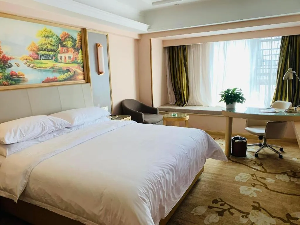 Bed in Vienna Hotel Yunnan Chunrong Street Qicai Yunan