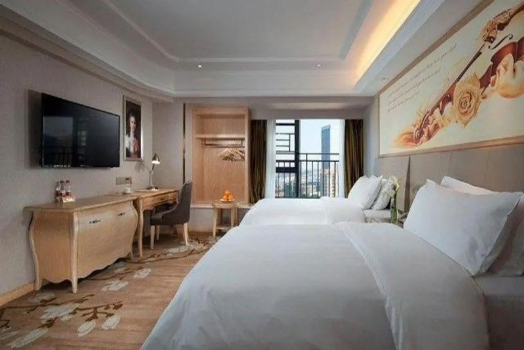 Bed in Vienna Hotel Yunnan Chunrong Street Qicai Yunan