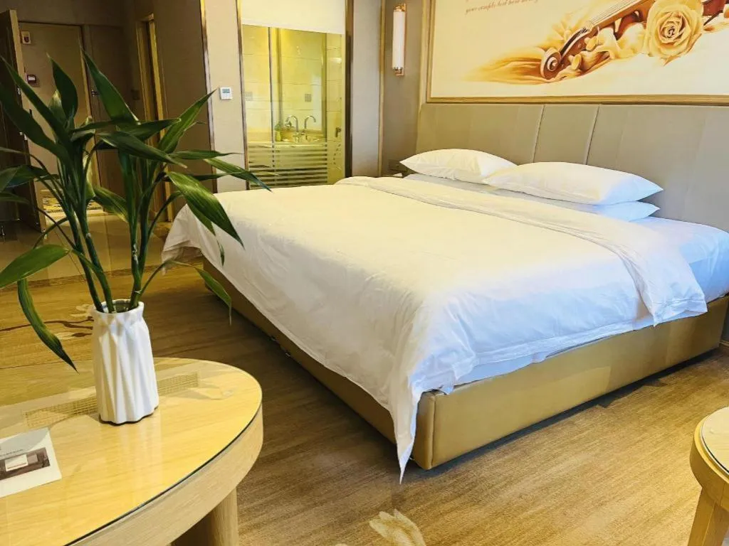 Bed in Vienna Hotel Yunnan Chunrong Street Qicai Yunan