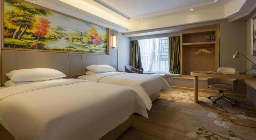 Bed in Vienna Hotel Yunnan Chunrong Street Qicai Yunan