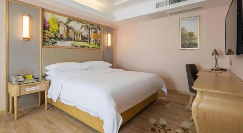 Bed in Vienna Hotel Yunnan Chunrong Street Qicai Yunan