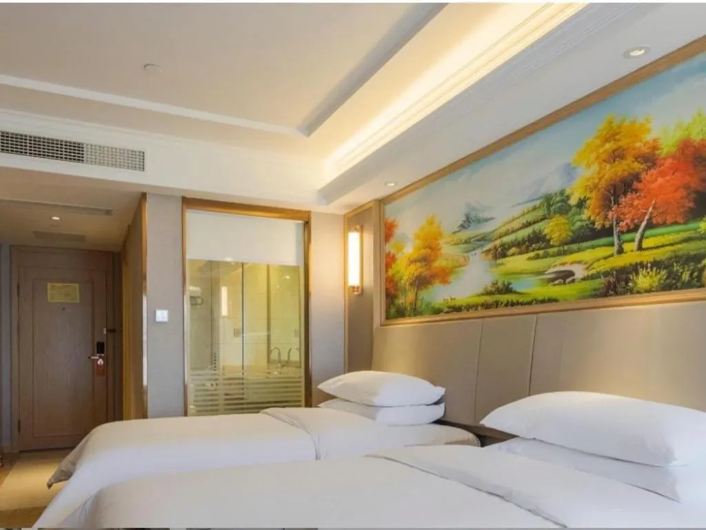 Bed in Vienna Hotel Yunnan Chunrong Street Qicai Yunan