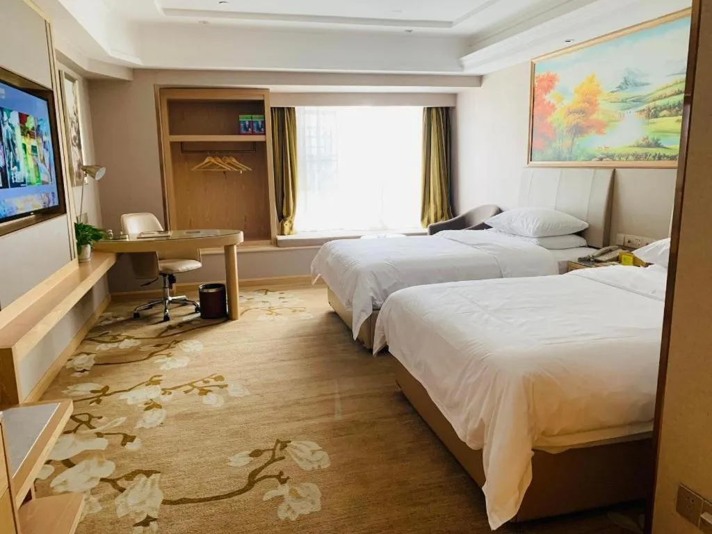 Bed in Vienna Hotel Yunnan Chunrong Street Qicai Yunan