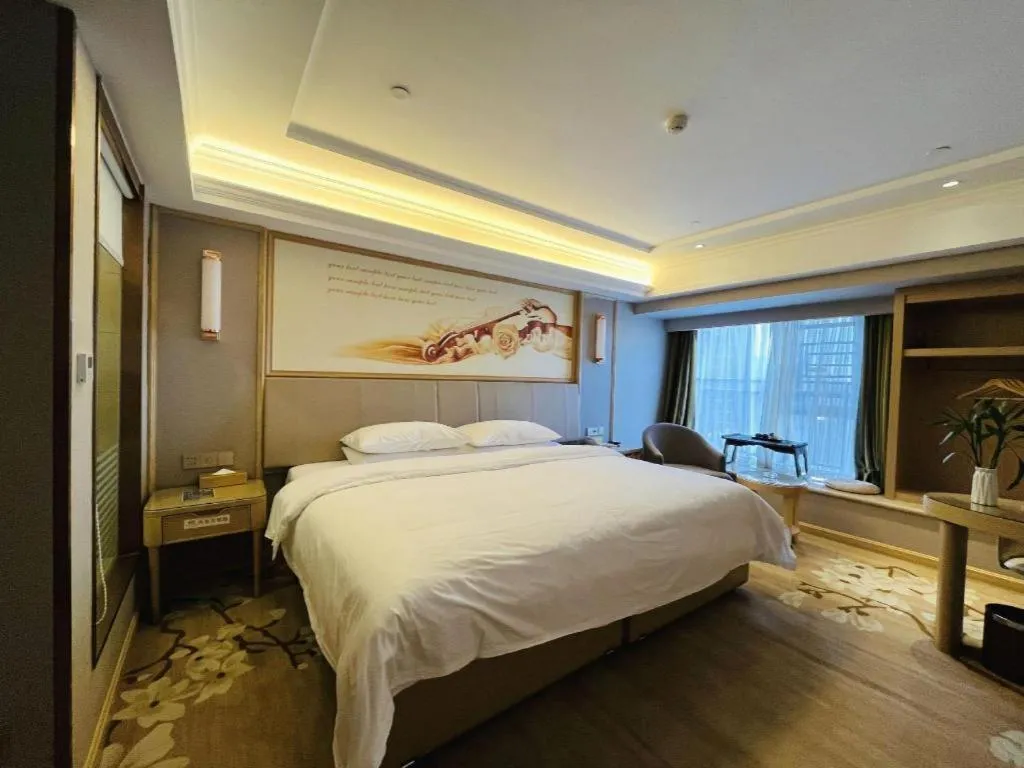 Bed in Vienna Hotel Yunnan Chunrong Street Qicai Yunan