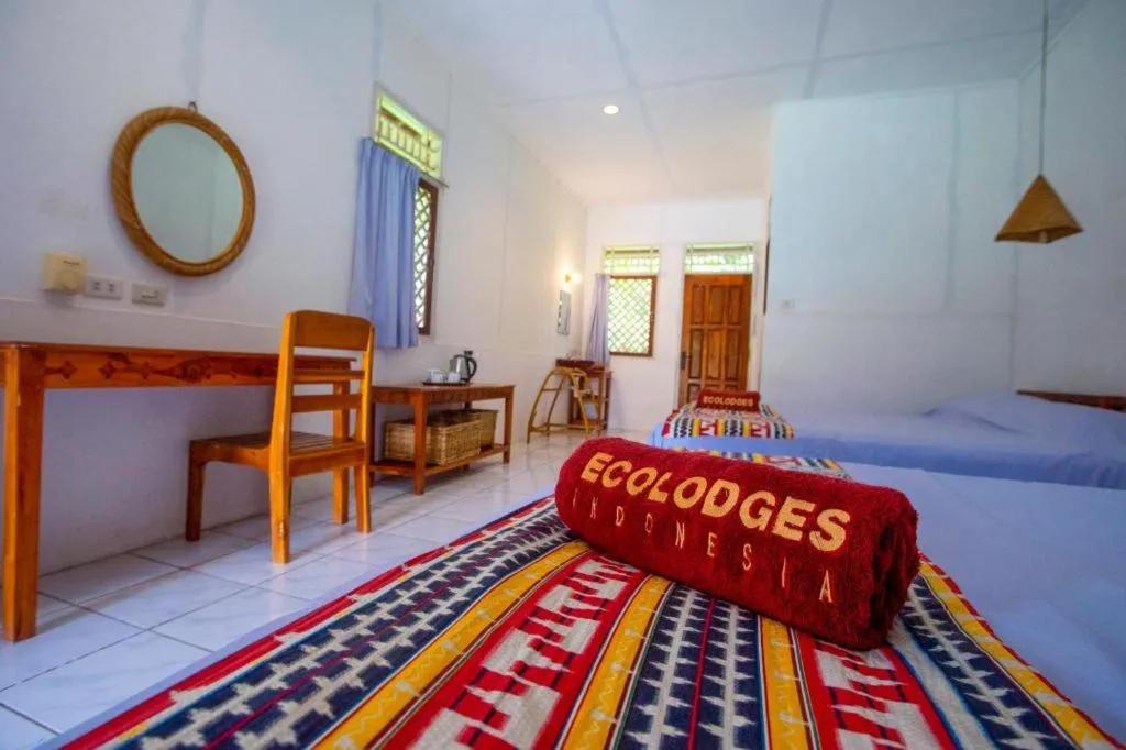 Bed in Satwa Elephant Eco Lodge