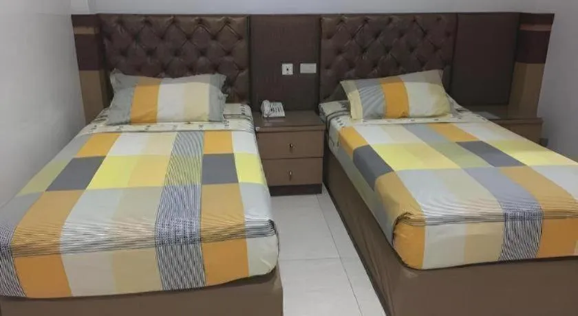 Bed in Metro Hotel