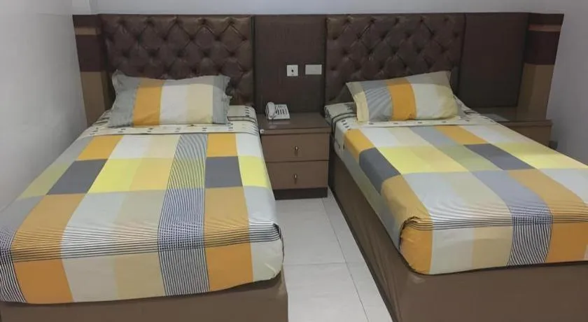 Bed in Metro Hotel
