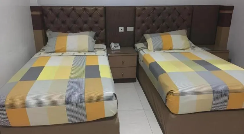 Bed in Metro Hotel