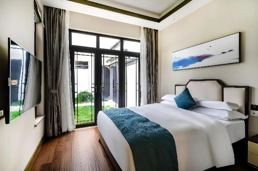 Bed in Poltton International Service Apartment Fujian Changtai Mayangxi