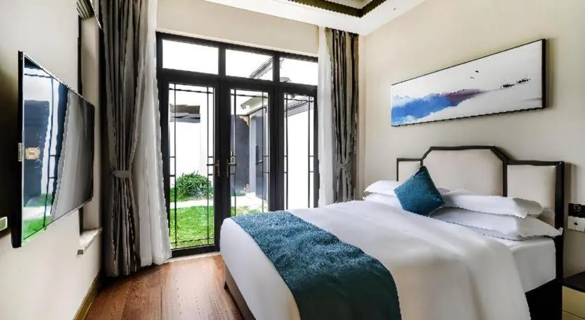 Bed in Poltton International Service Apartment Fujian Changtai Mayangxi