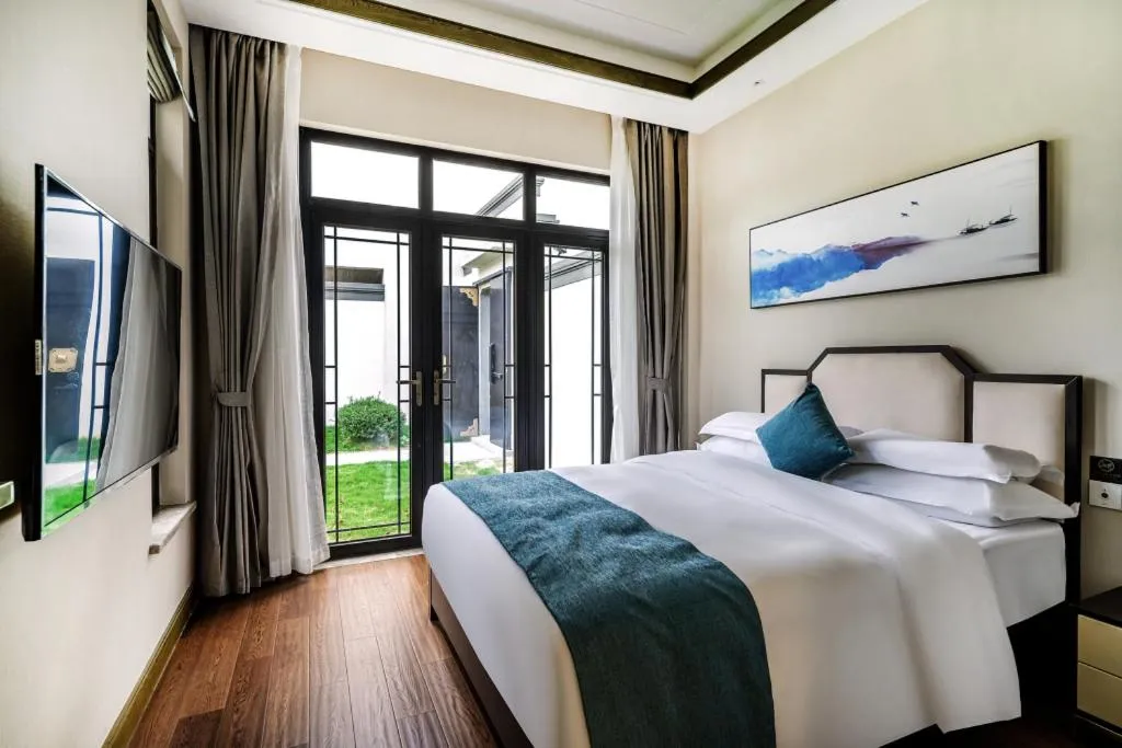 Bed in Poltton International Service Apartment Fujian Changtai Mayangxi