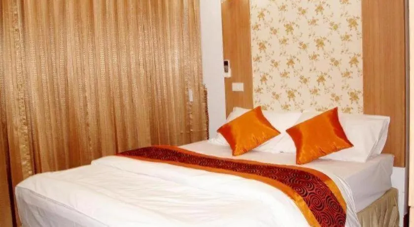 Bed in Diamond Sweet Hotel