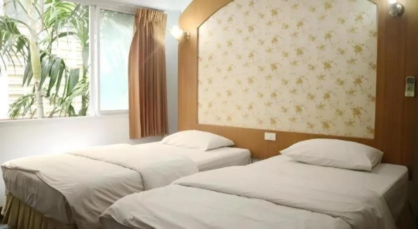 Bed in Diamond Sweet Hotel