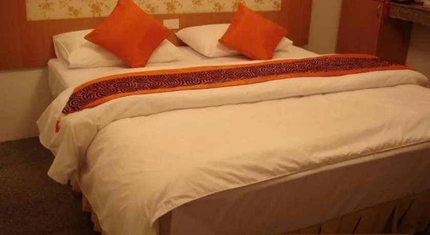 Bed in Diamond Sweet Hotel