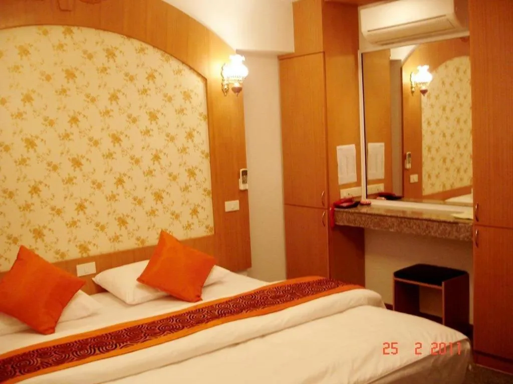 Bed in Diamond Sweet Hotel