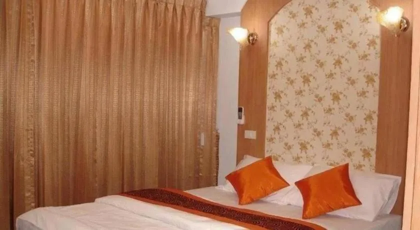 Bed in Diamond Sweet Hotel