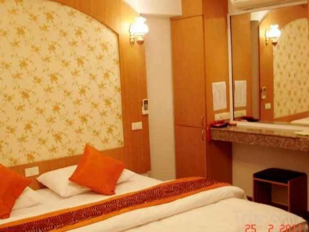 Bed in Diamond Sweet Hotel