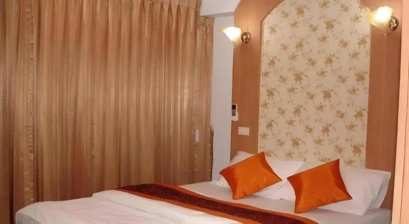 Bed in Diamond Sweet Hotel