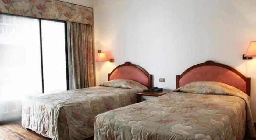 Bed in Paisiri Hotel