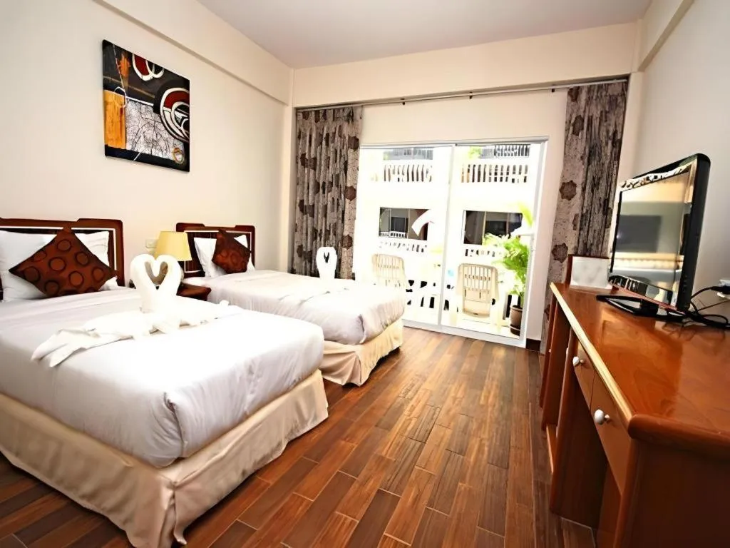 Bed in Paisiri Hotel