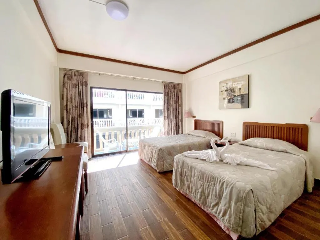 Bed in Paisiri Hotel