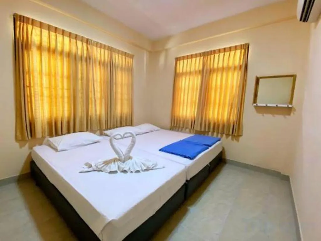 Bed in Paisiri Hotel