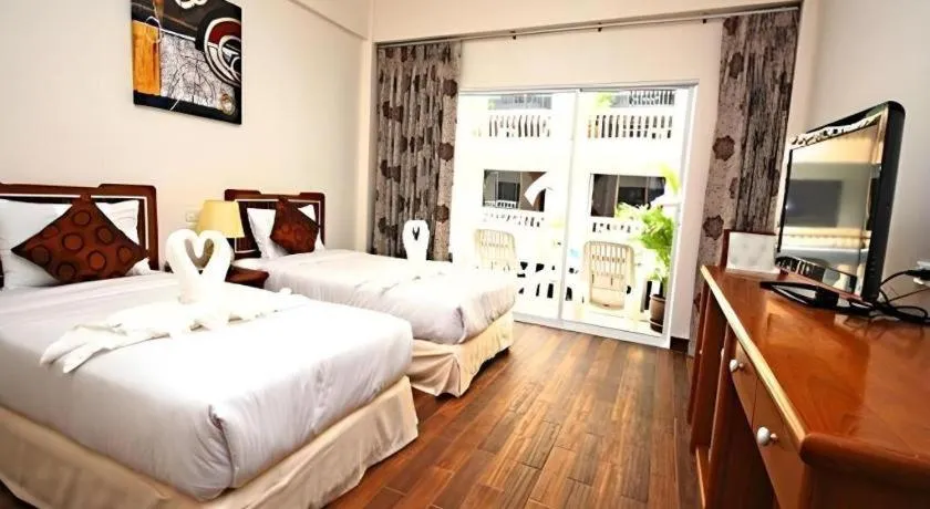 Bed in Paisiri Hotel