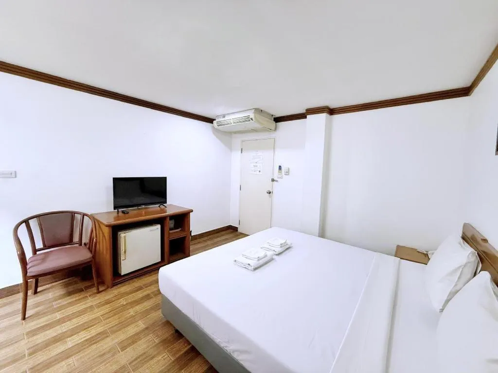 Bed in Paisiri Hotel