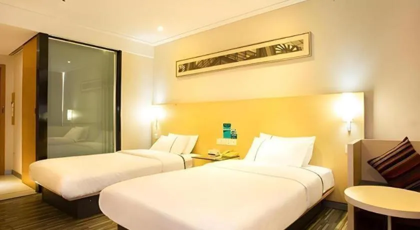 Bed in City Comfort Inn Guiping Xishan